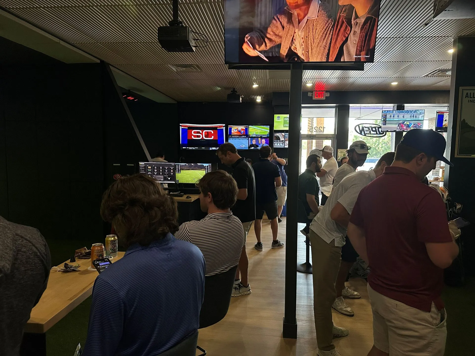 Corporate golf event at All Seasons Indoor Golf Club event space in Kansas City